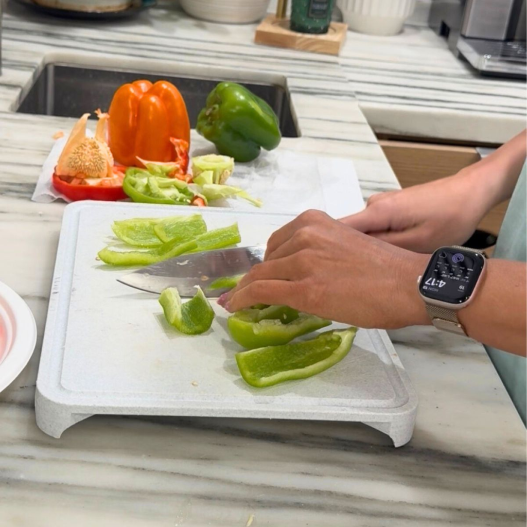Chopping bell peppers as part of simple weekly meal prep