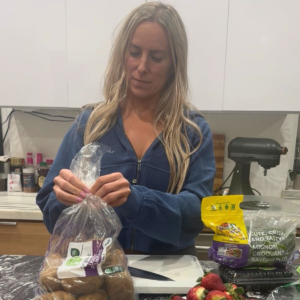 Busy mom prepping groceries in the kitchen for the week ahead