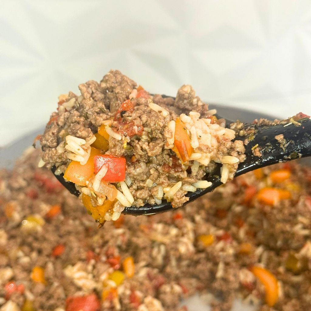 spoonful of unstuffed pepper skillet with ground beef rice and bell peppers