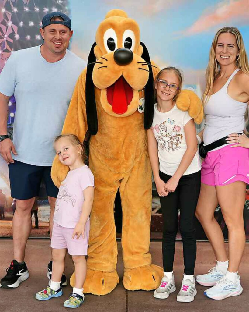 Family photo at Disney World showing comfortable mom outfit