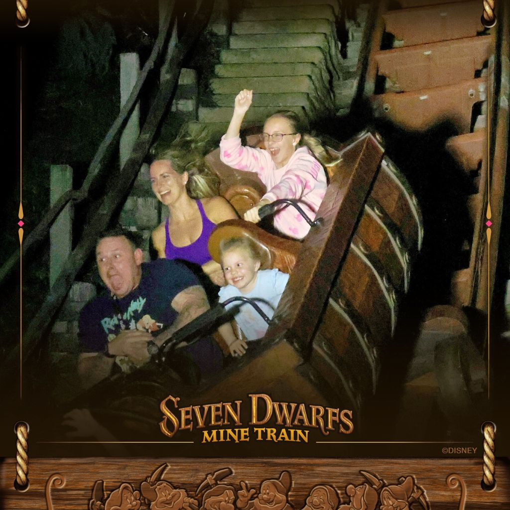 Family ride photo on Seven Dwarfs Mine Train roller coaster at Magic Kingdom