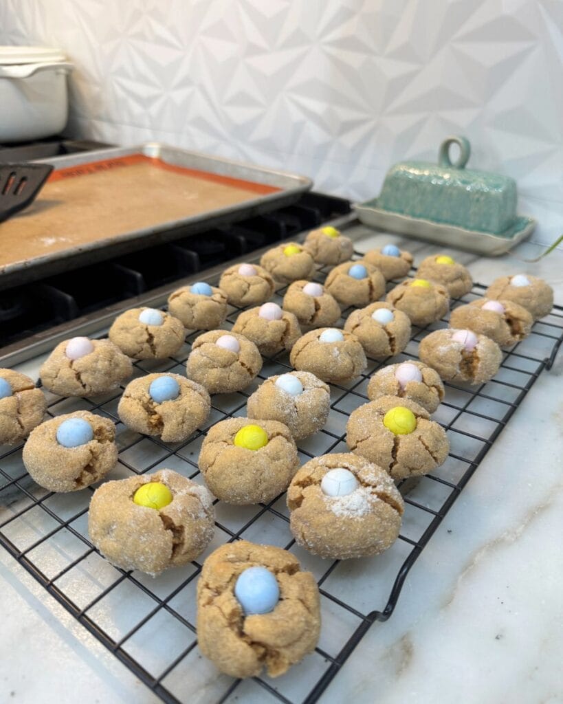 peanut butter blossom cookies cooling on rack