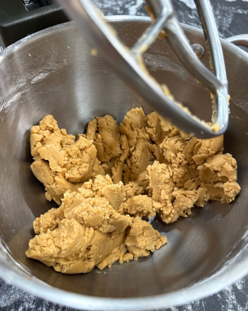peanut butter cookie dough in stand mixer