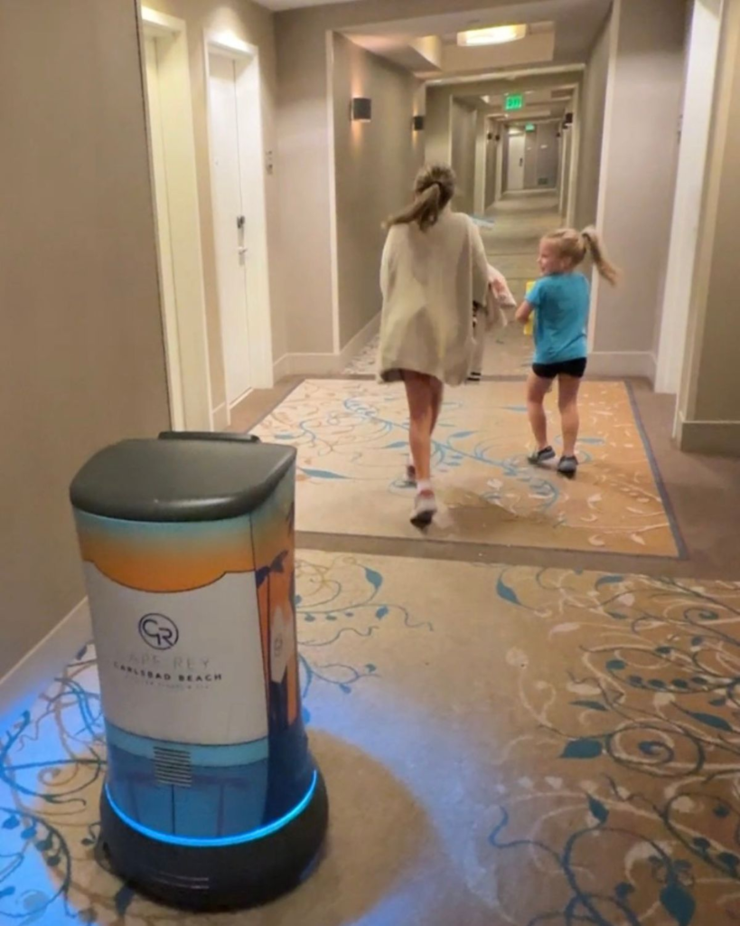Hotel delivery robot bringing items through the hallway at the Grand Pacific Resort in Carlsbad California