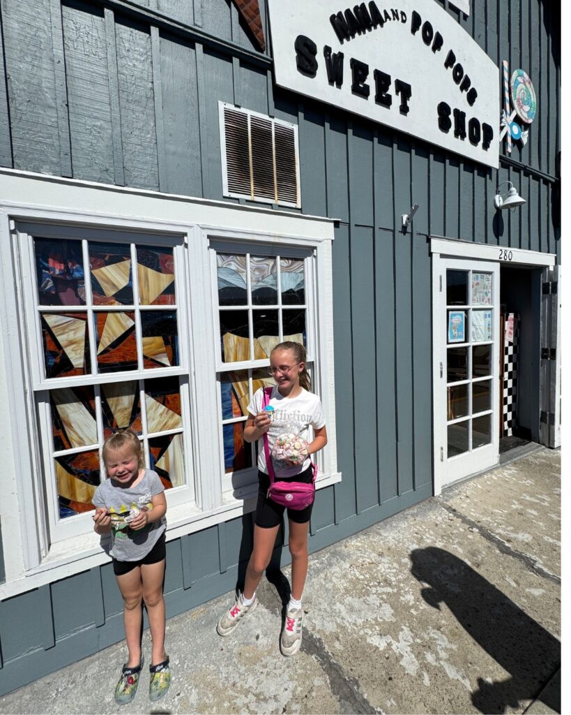 Kids enjoying treats outside Nana and Pop Pop’s Sweet Shop in Oceanside California