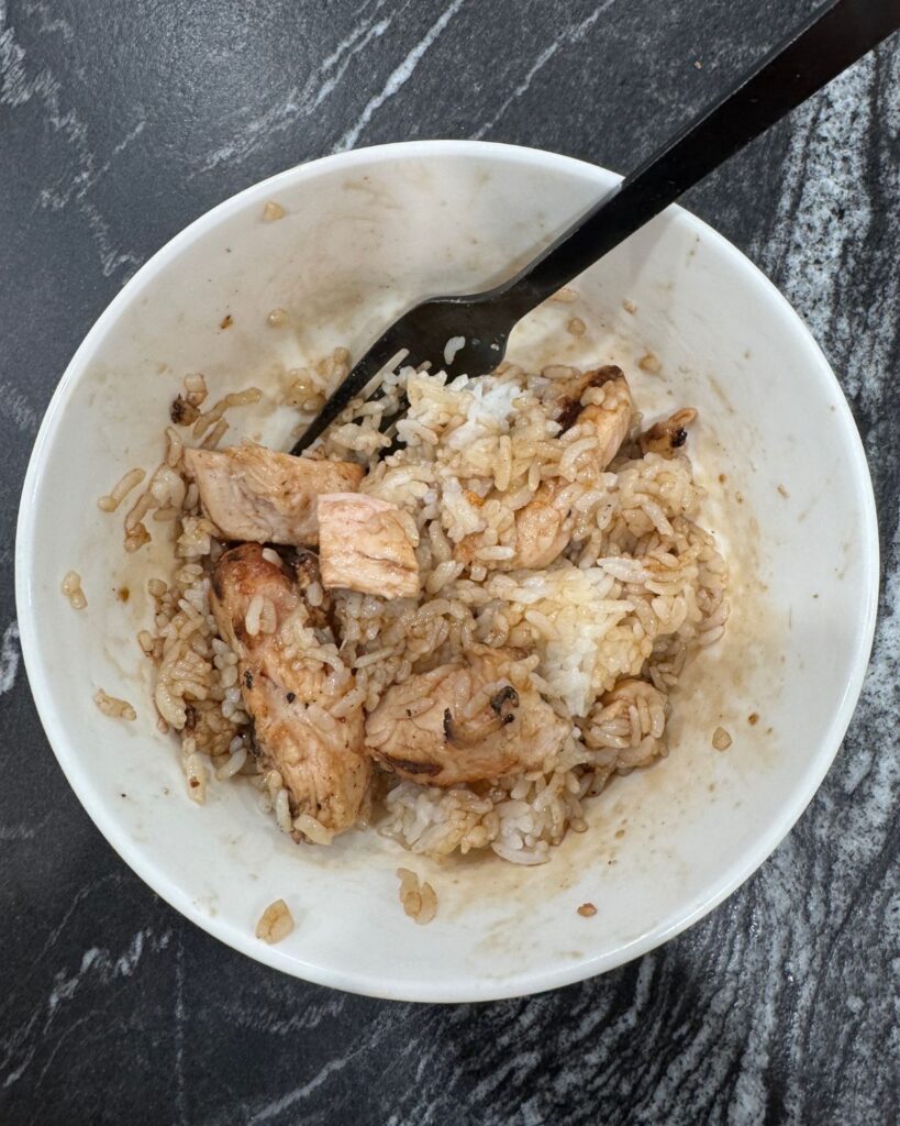 chicken bites with rice and sauce