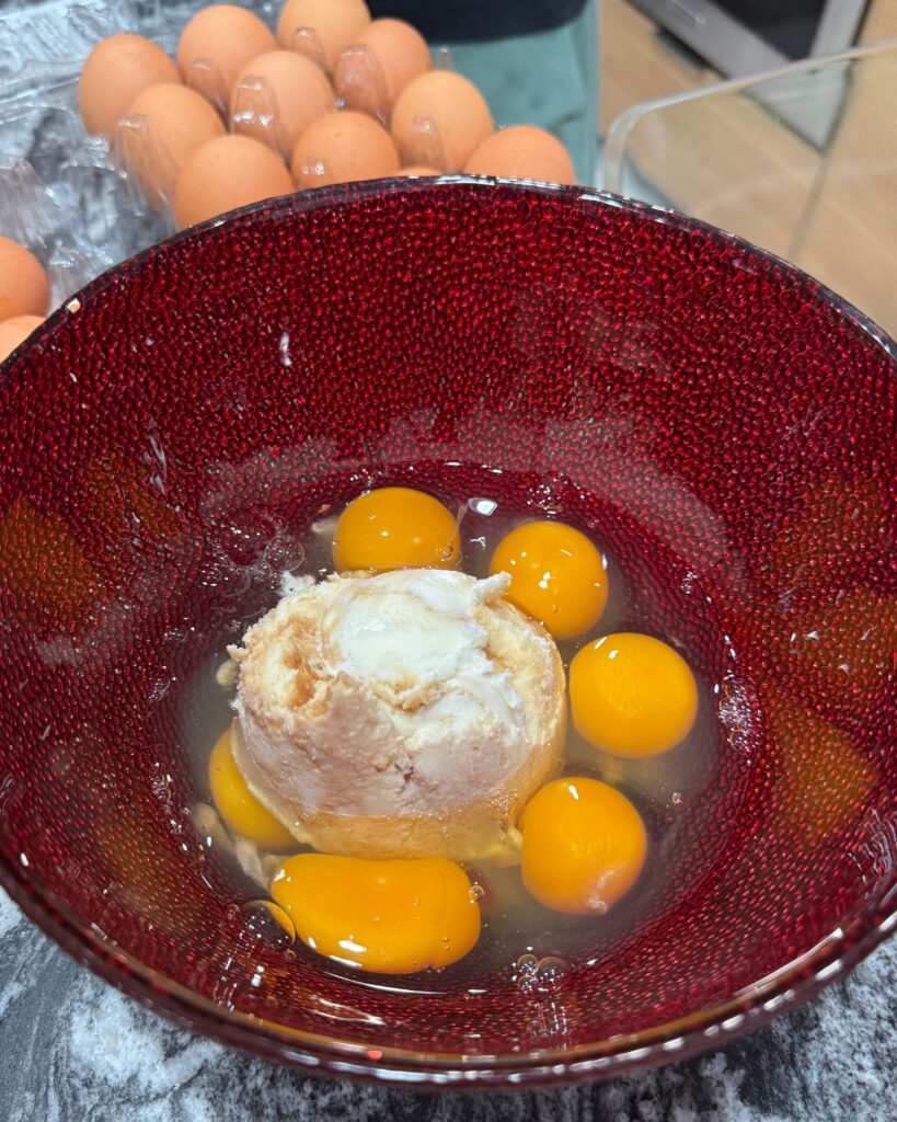 Eggs and ice cream in a bowl for making rich French toast custard