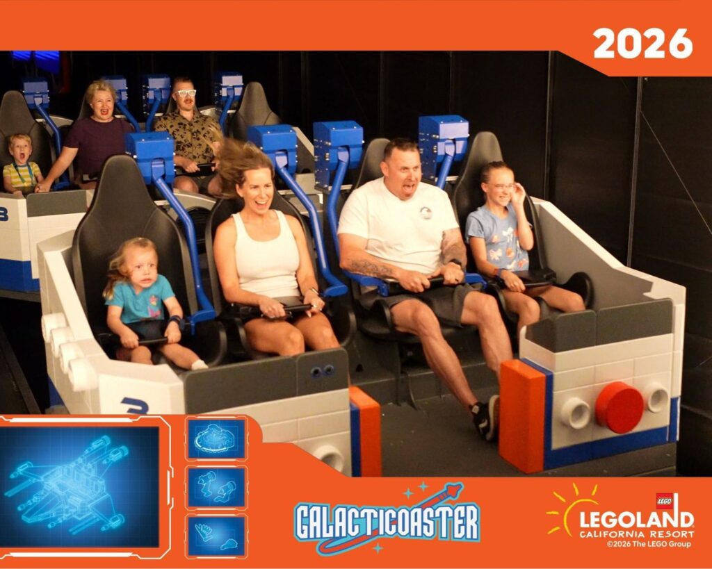 Family riding LEGO themed roller coaster attraction at LEGOLAND California