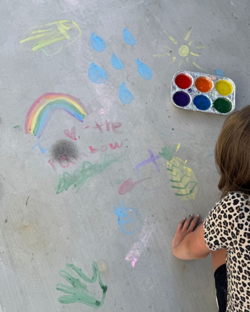 summer bucket list for families sidewalk chalk painting activity at home
