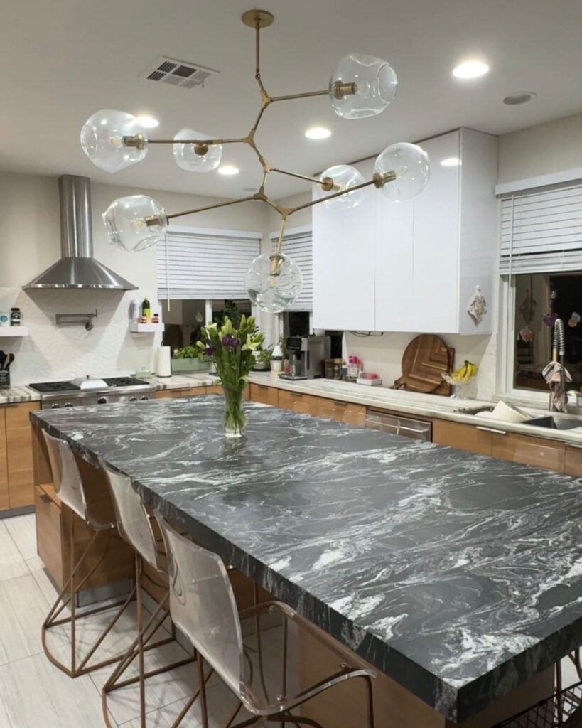 clean kitchen during a Sunday reset routine with organized counters and fresh flowers