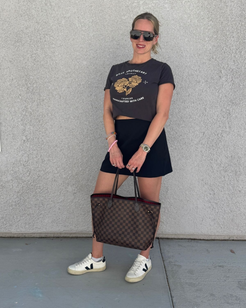 mom wearing black skort with graphic t, elevated causal style