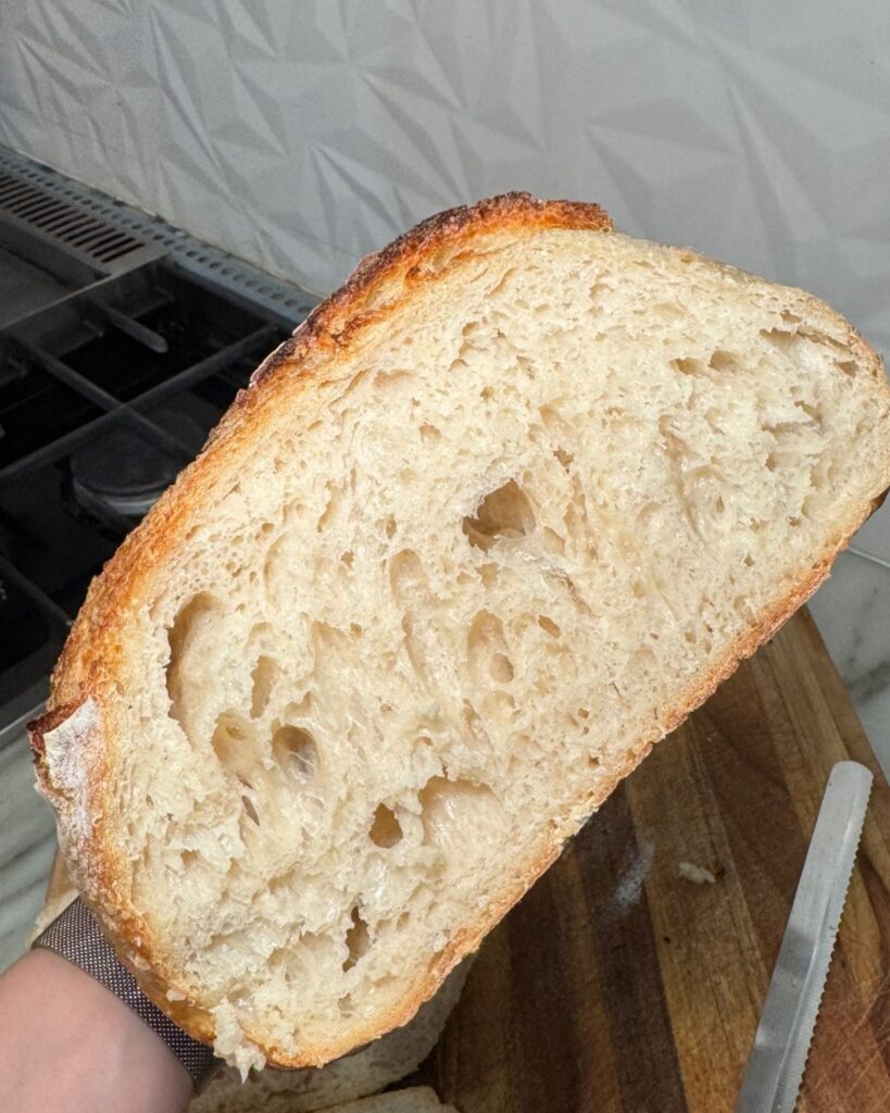 Close-up of the soft interior crumb of homemade sourdough bread.