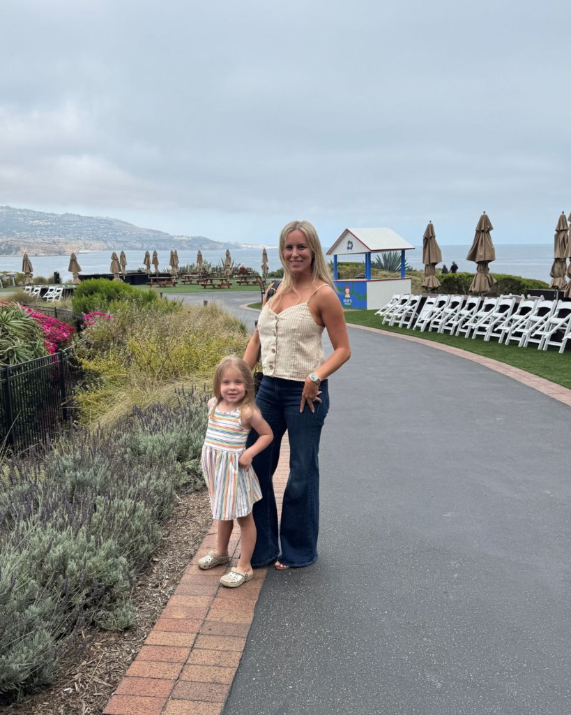 Julie and her daughter walking at Terranea Resort in Rancho Palos Verdes during a family Mother's Day getaway.
