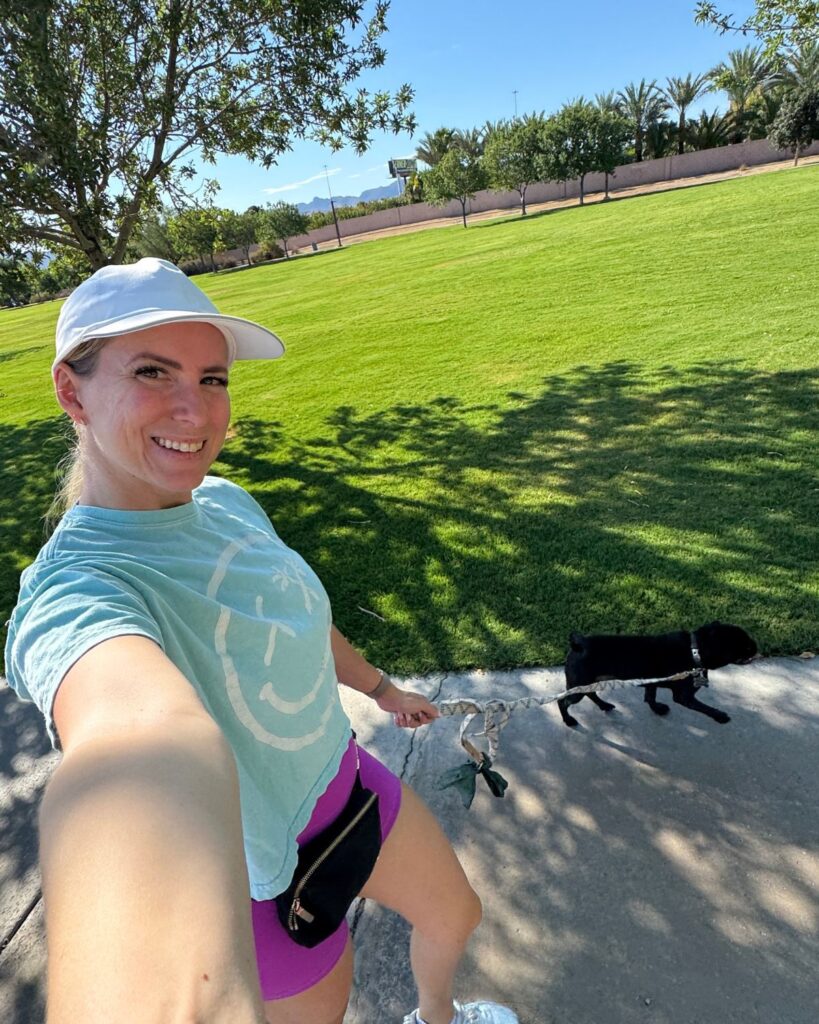 Julie walking outdoors during early breast lift and implant exchange recovery