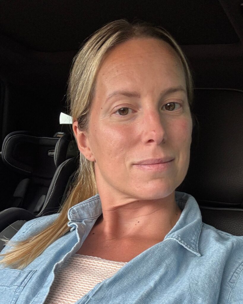 Julie in the car after her first post-op appointment following breast surgery