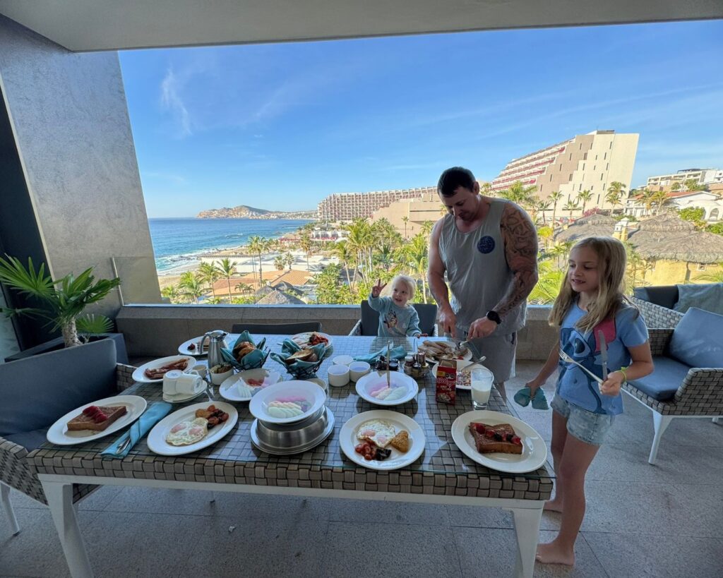 Room service breakfast spread on a patio at Garza Blanca Cabo