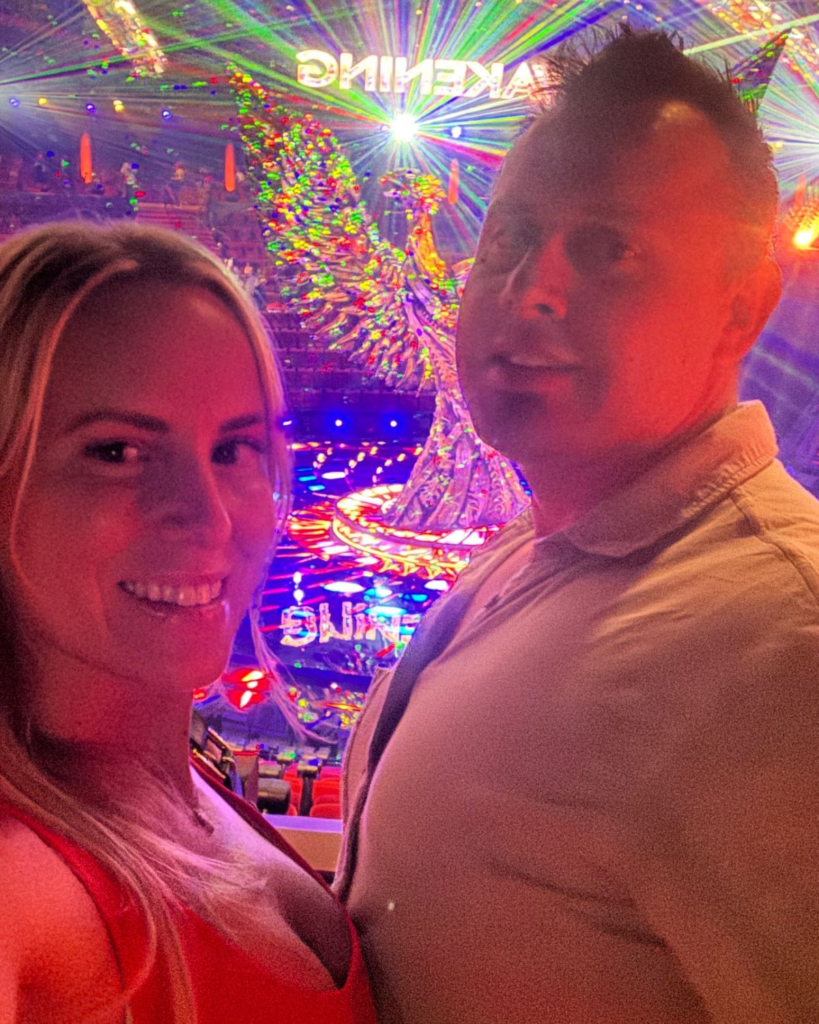 Julie and Corey taking a selfie inside the Awakening theater at Wynn Las Vegas