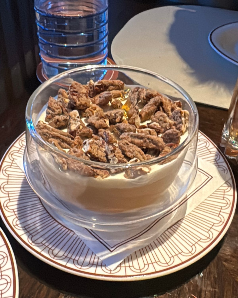 Butterscotch dessert topped with candied pecans at Sartiano’s in Wynn Las Vegas